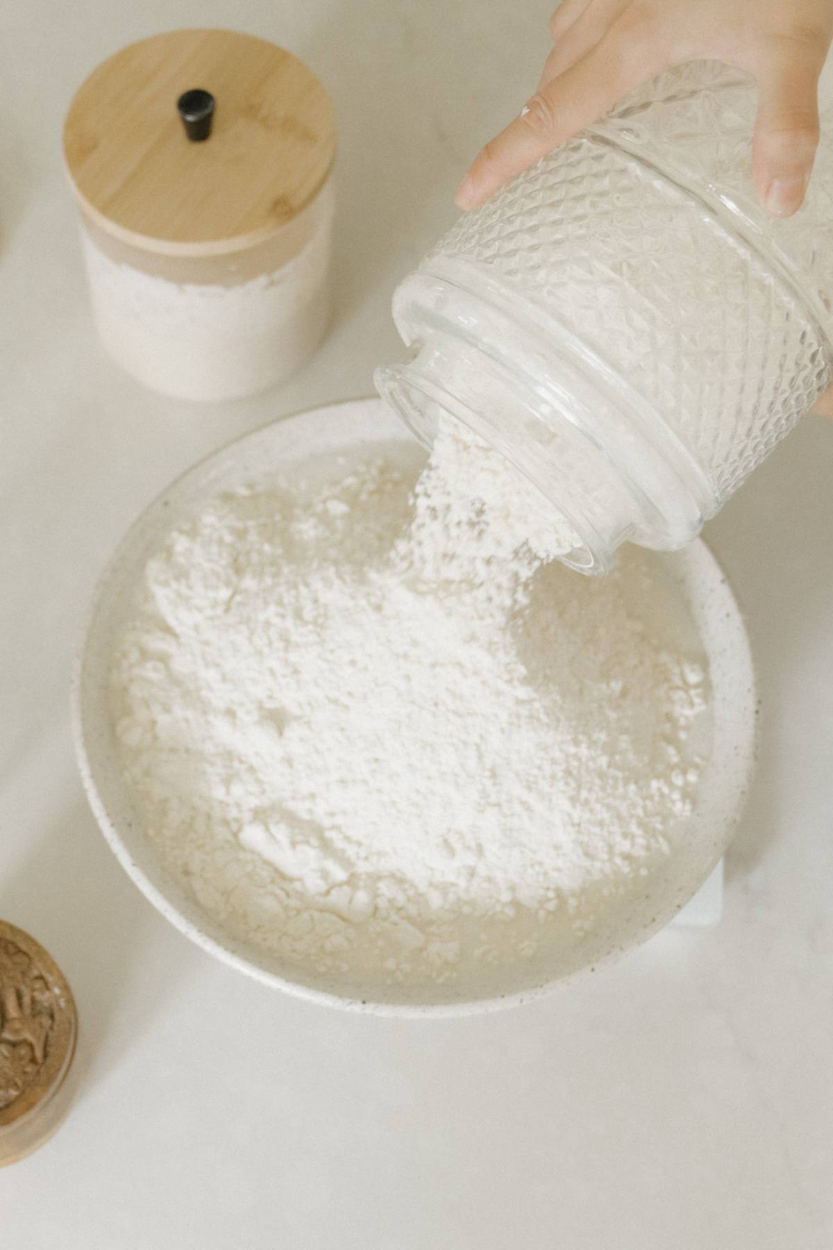 Adding the flour to a bowl