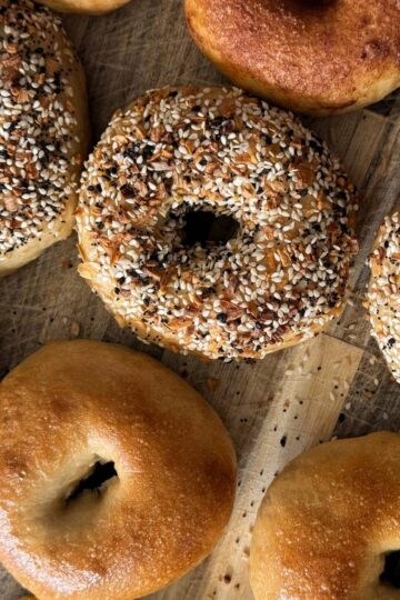 Sourdough bagels on a cutting board