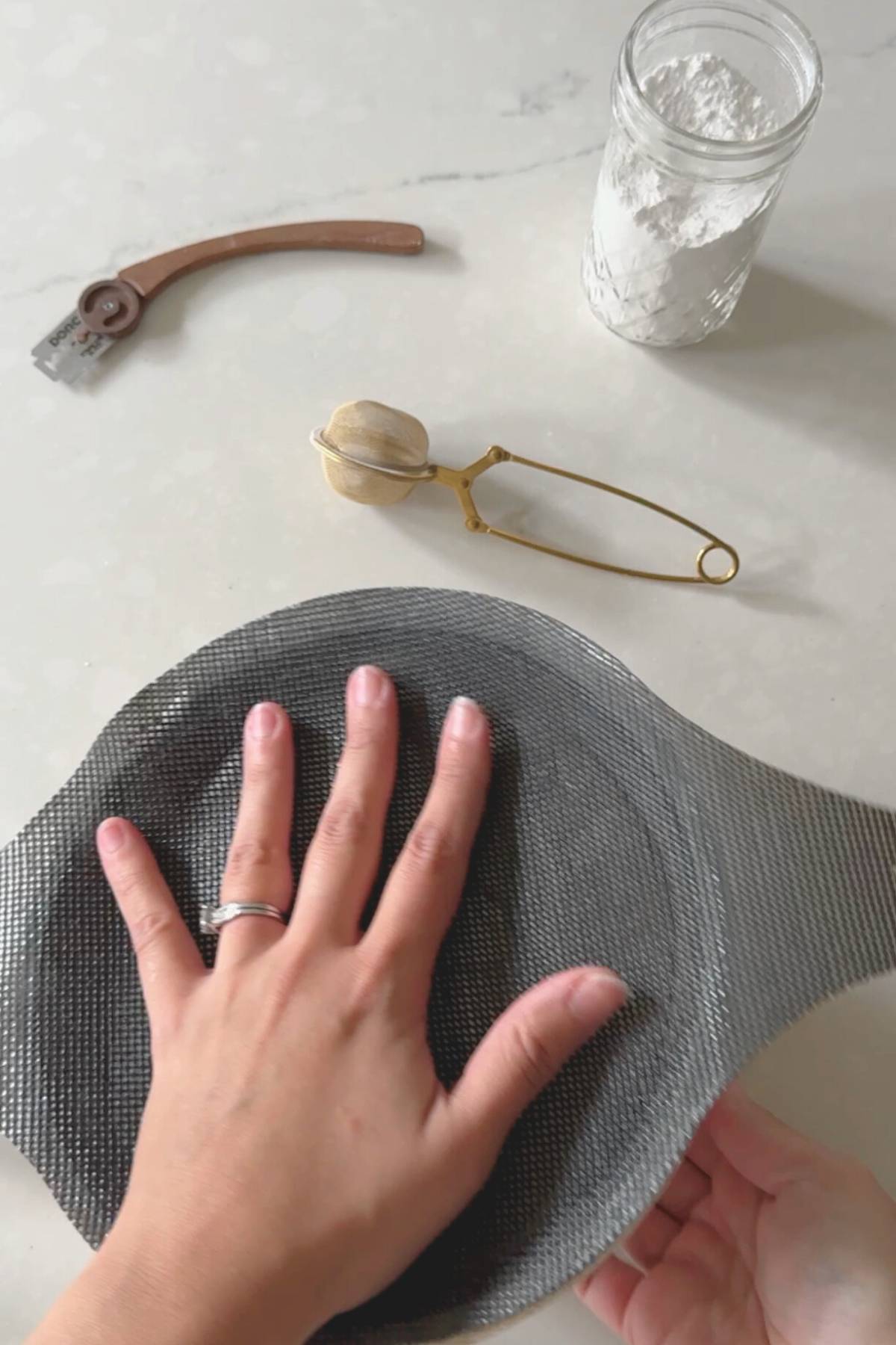 flipping the banneton over a dough sling