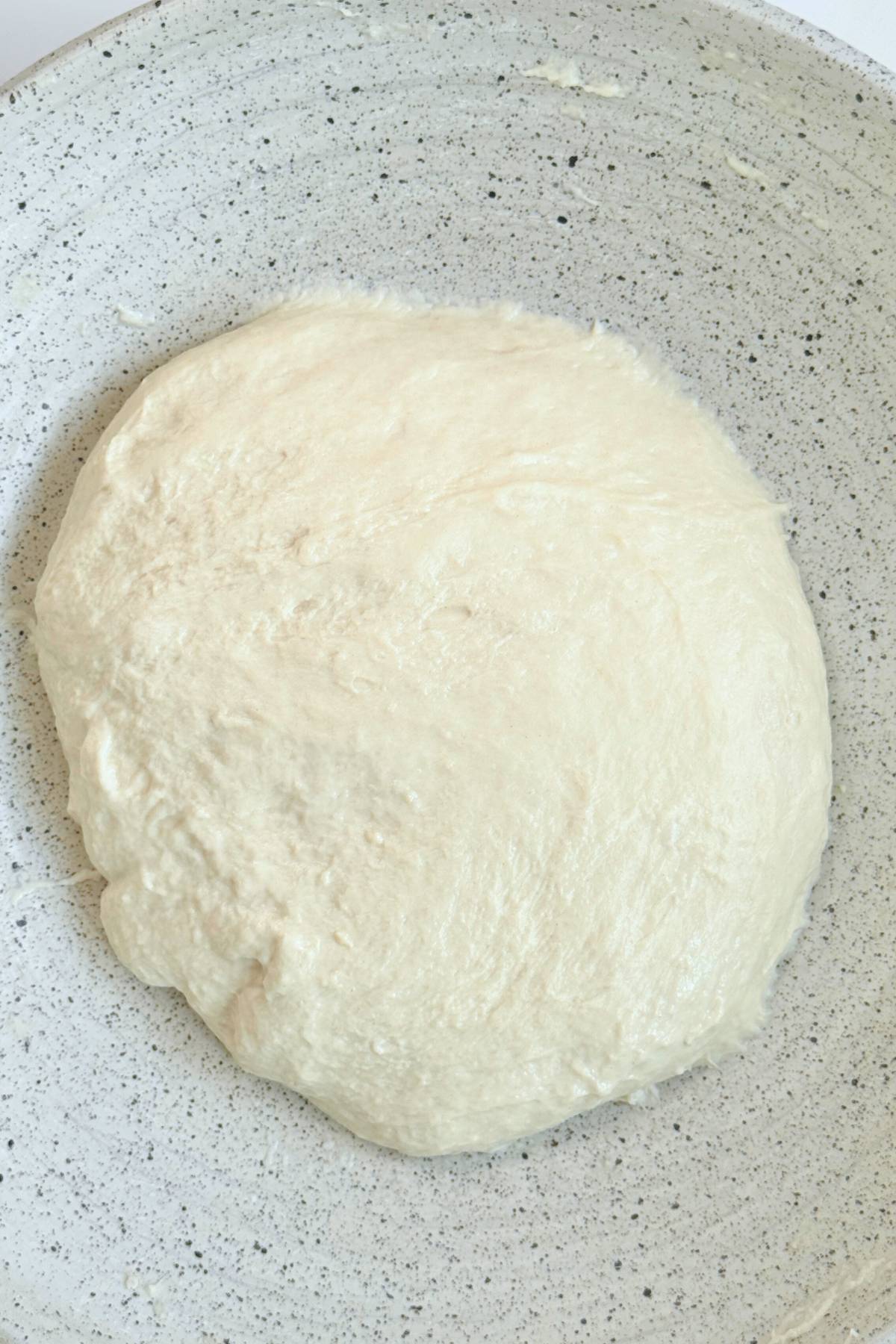 smooth but sticky ball of dough