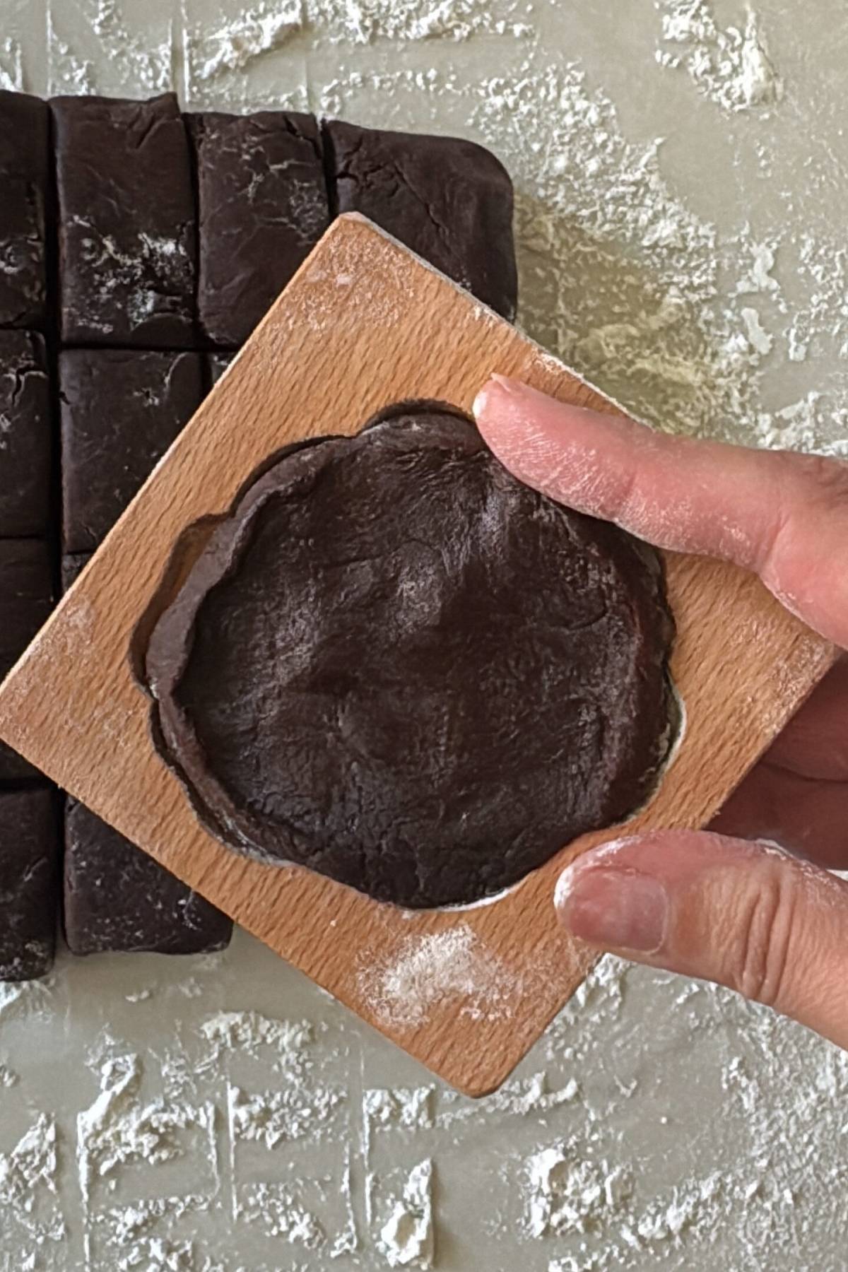 cookie dough on the wooden mold