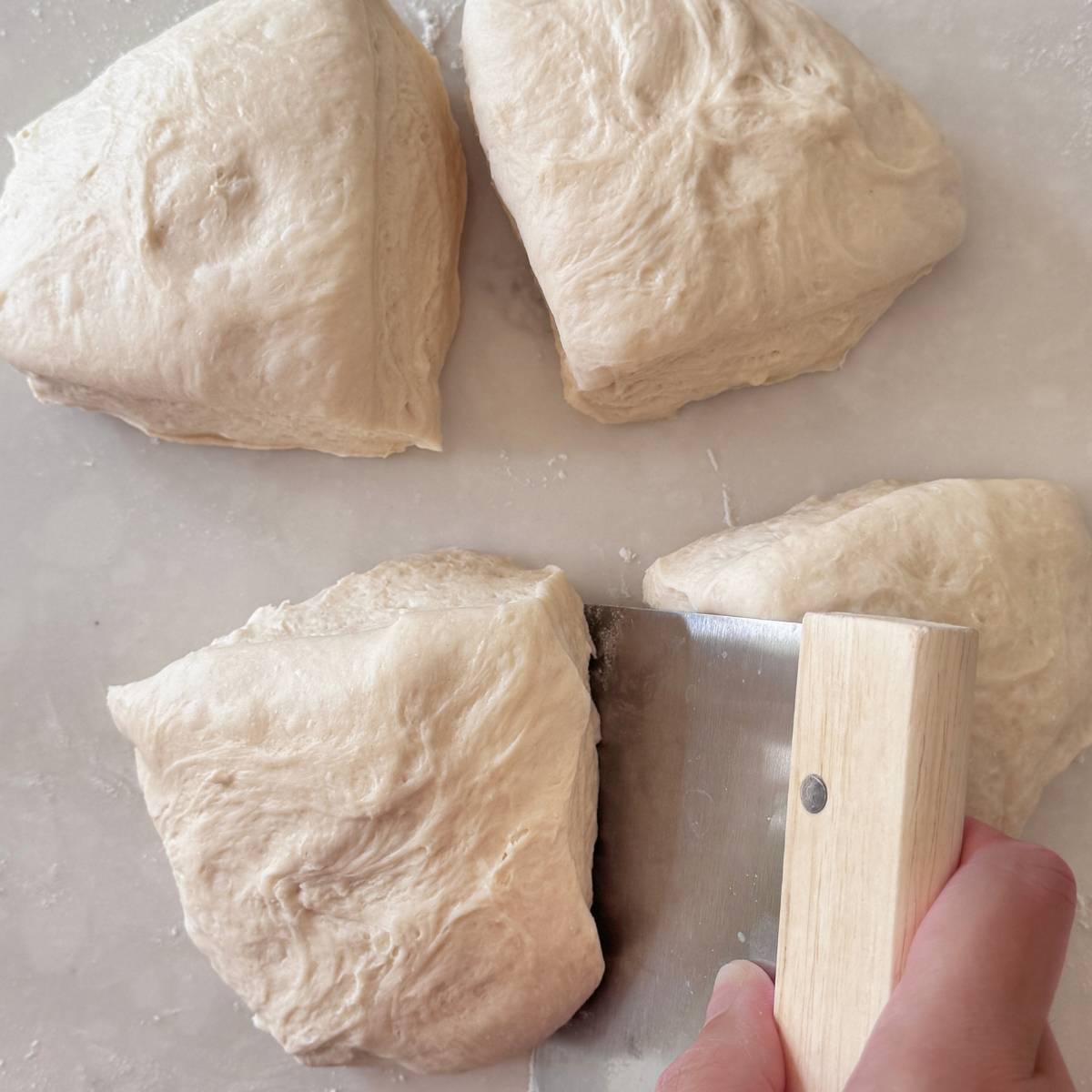 dividing pizza dough