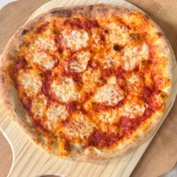homemade pizza on a cutting board