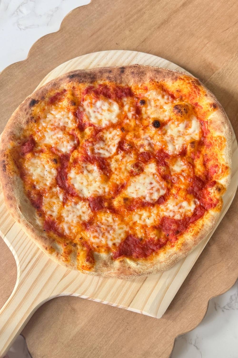 homemade pizza on a cutting board