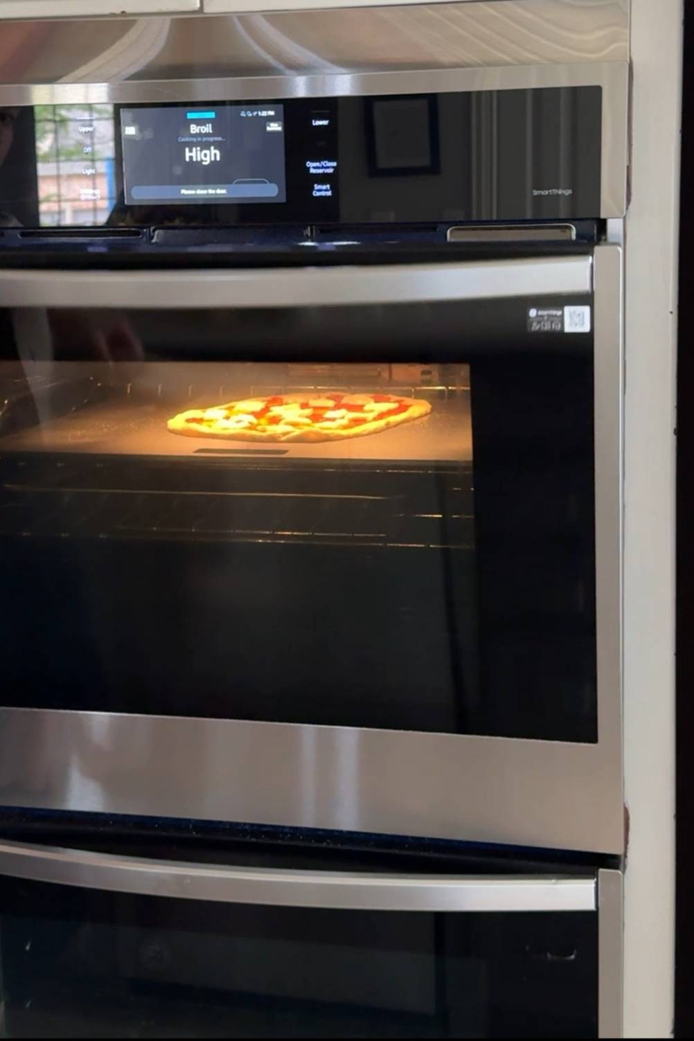 sourdough pizza dough being broiled in the oven