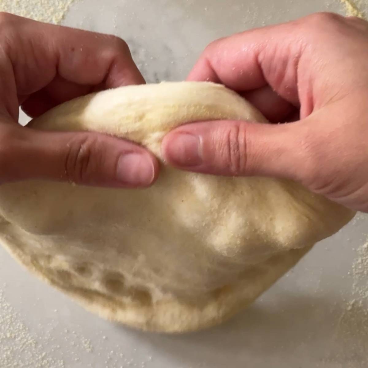 wheel method of shaping pizza dough