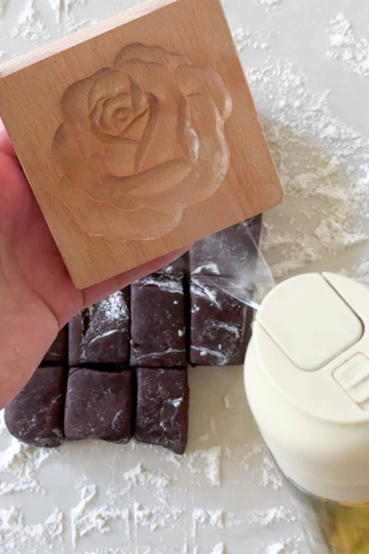 oiling the wooden cookie mold