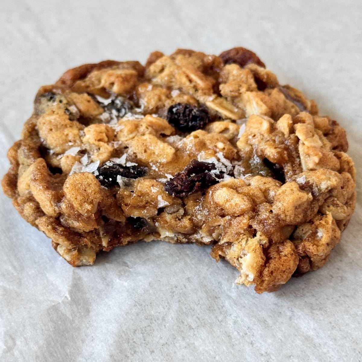 oatmeal raisin cookie with a bite taken out