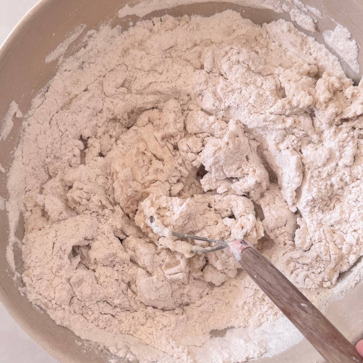 mixing ingredients for yeasted pizza