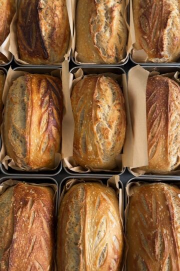several loaves of bread baked using the two pan method