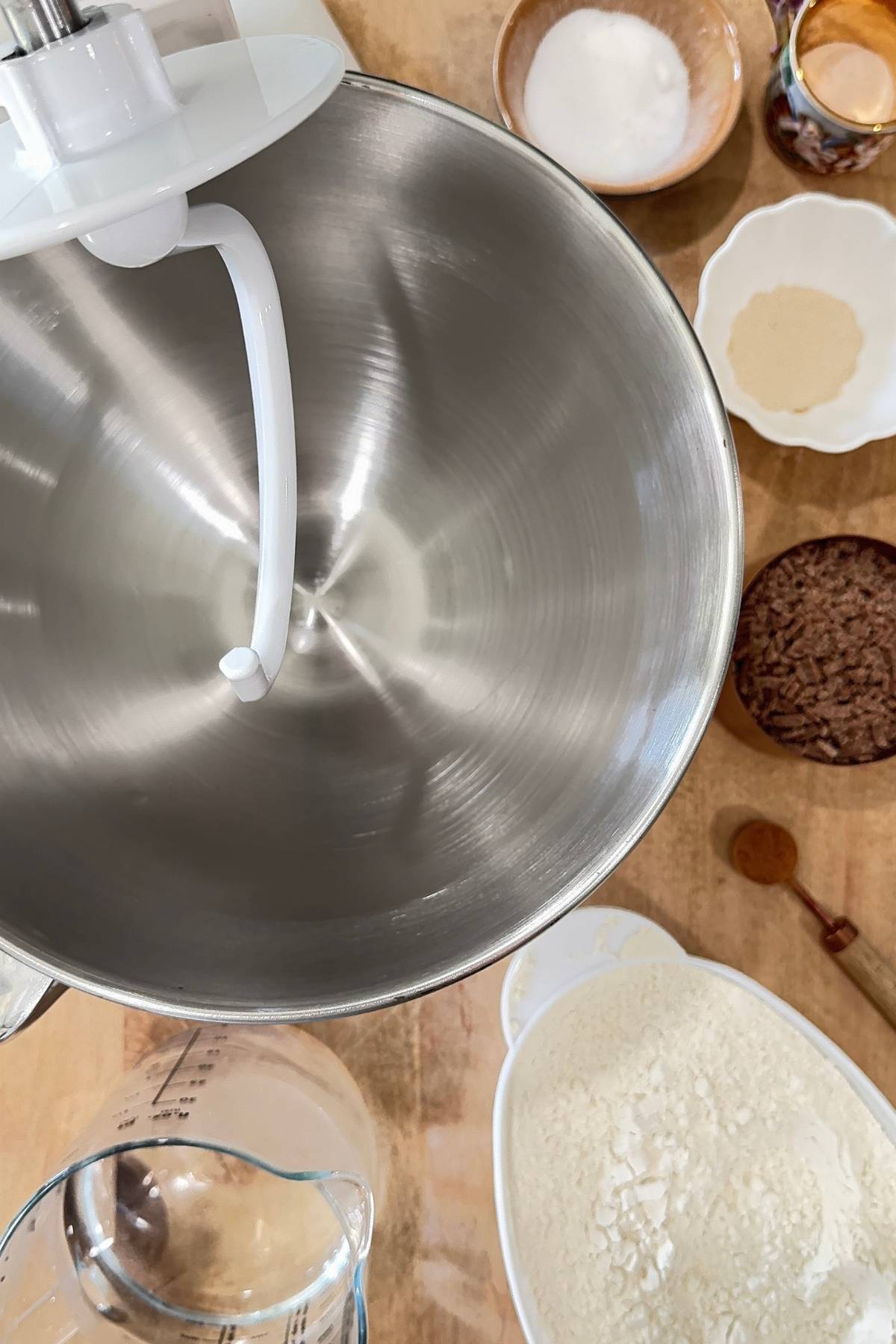 Photo showing the ingredients needed to make cinnamon sugar bagels and a stand mixer