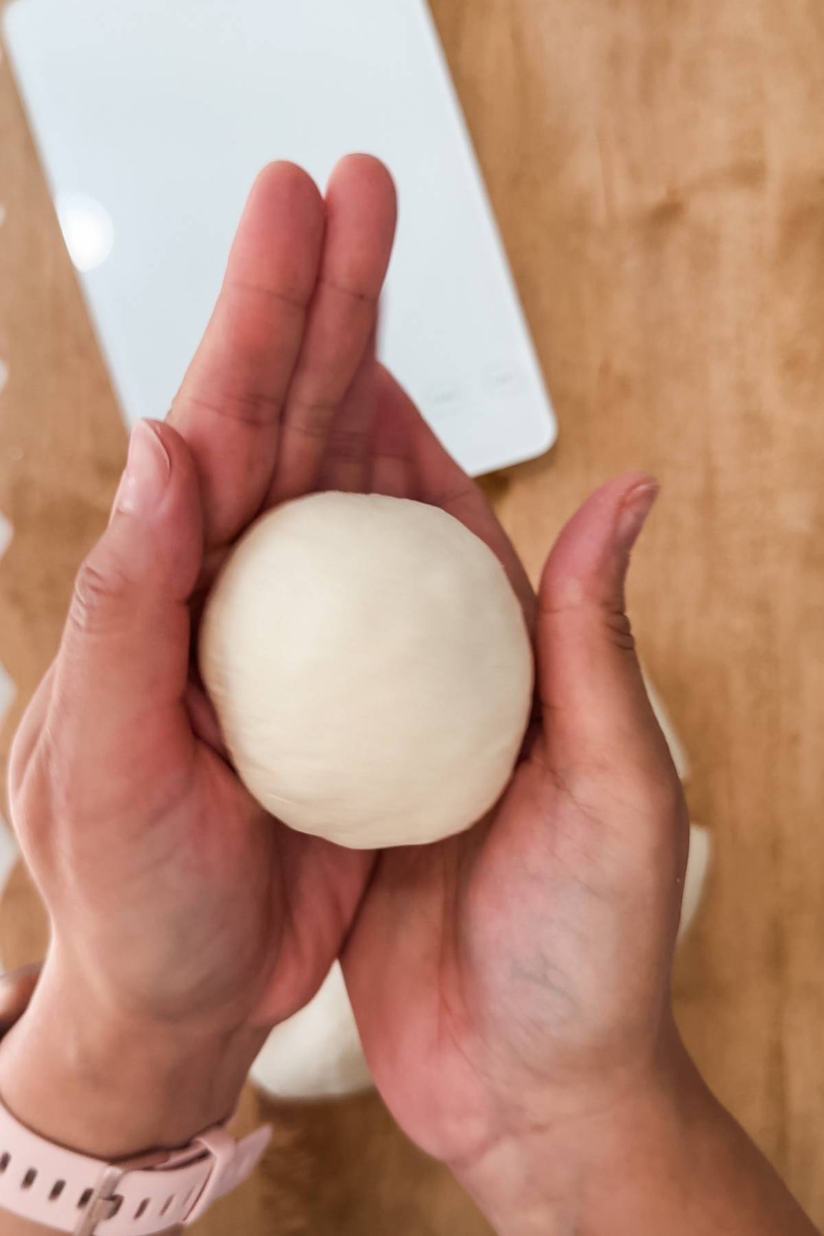 Shaping bagel dough into a ball