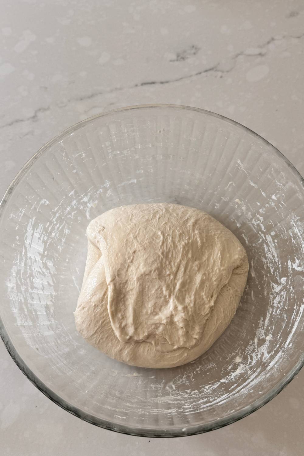 folding pizza dough once more