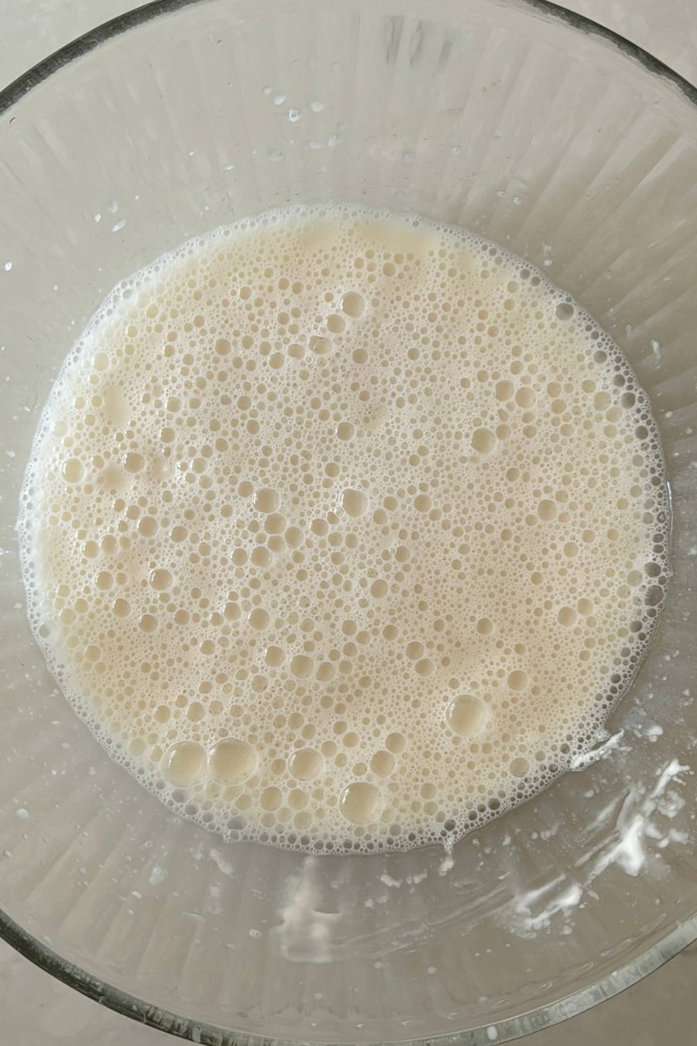 water and sourdough starter mixed until bubbly