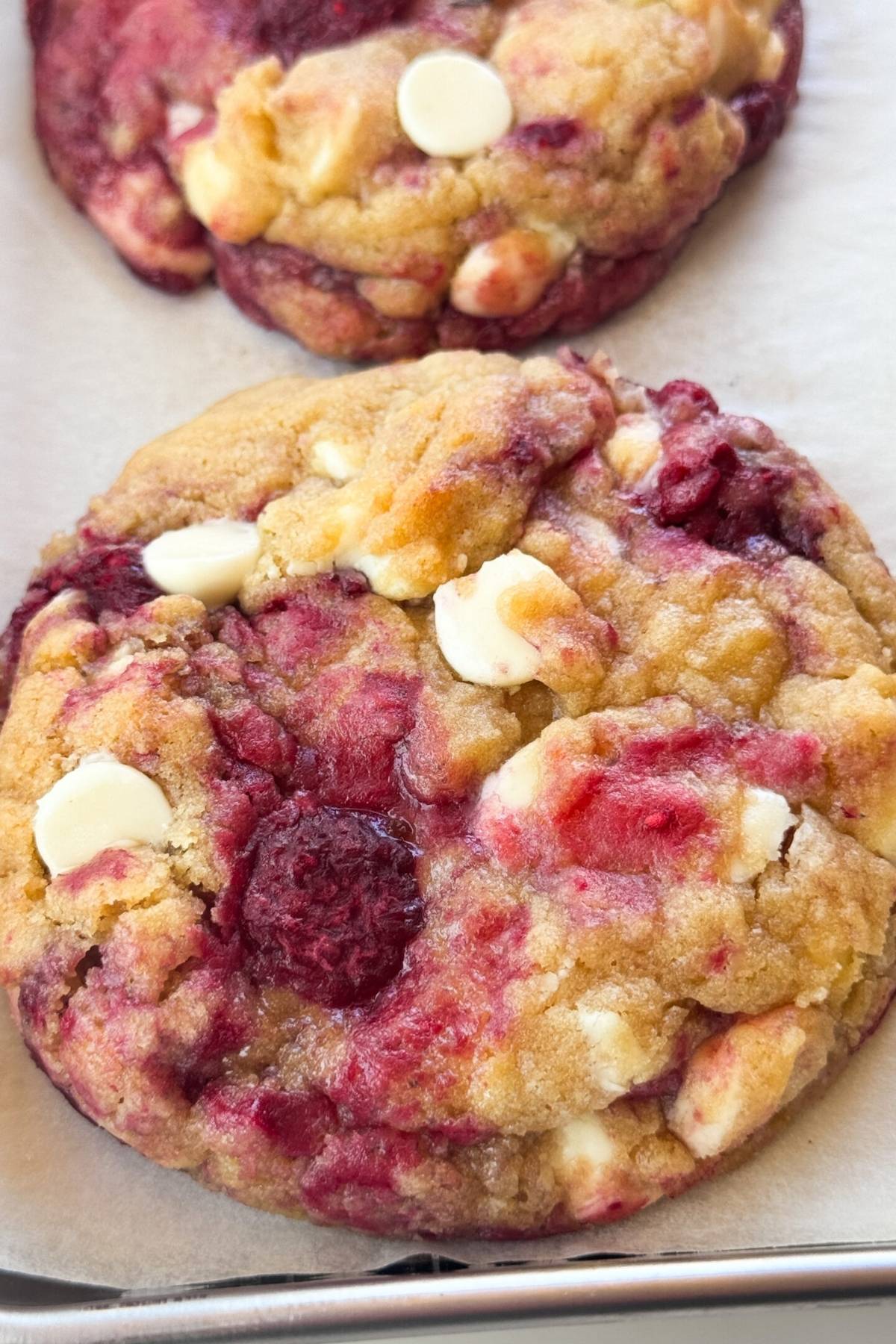 White Chocolate Raspberry Cookies on baking sheet