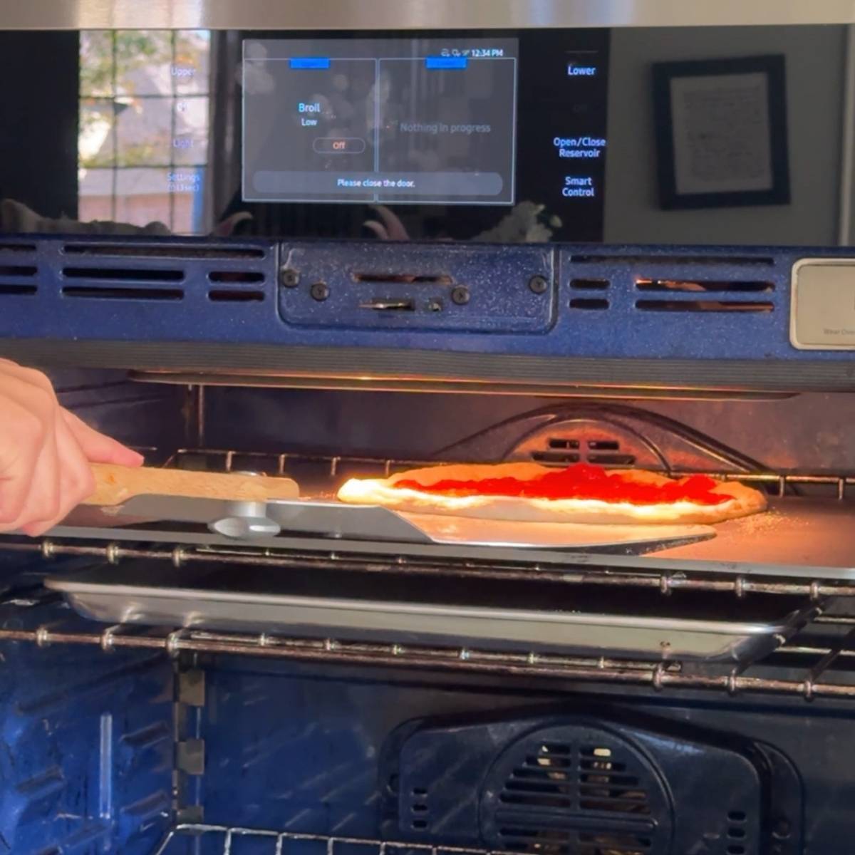 baking the dough and the sauce