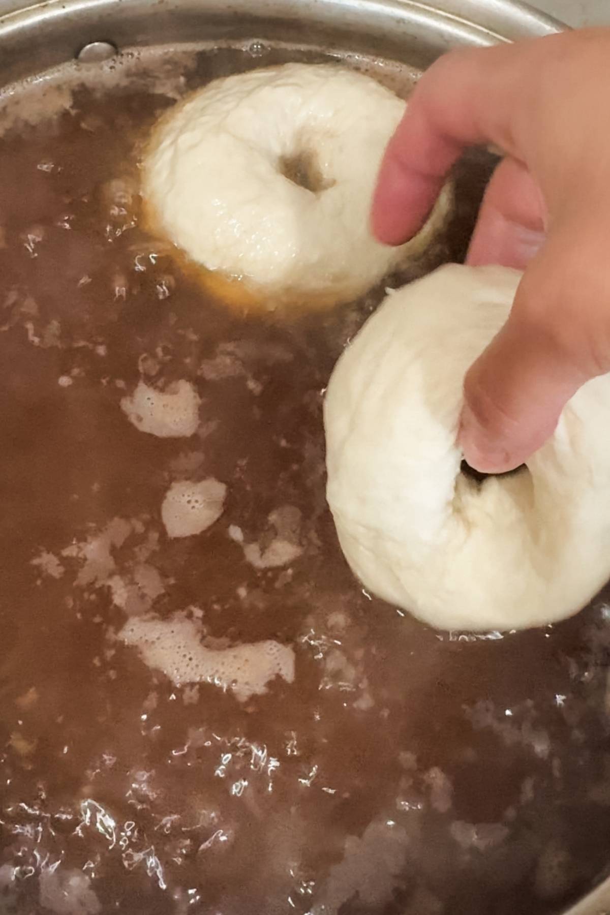 boiling the homemade asiago bagels