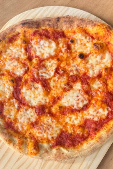 homemade pizza on a cutting board
