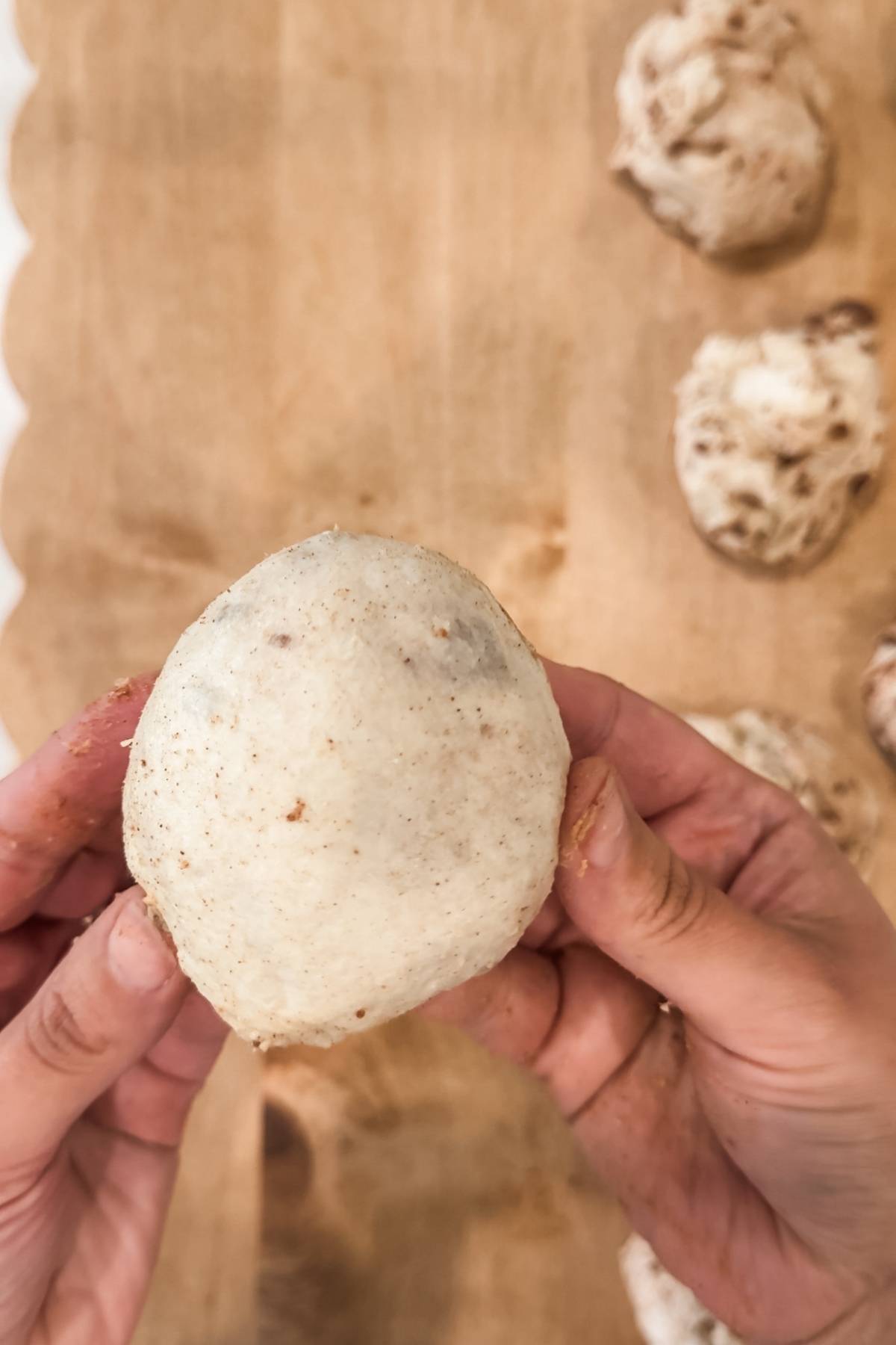 shaping Cinnamon Sugar Bagel dough into balls