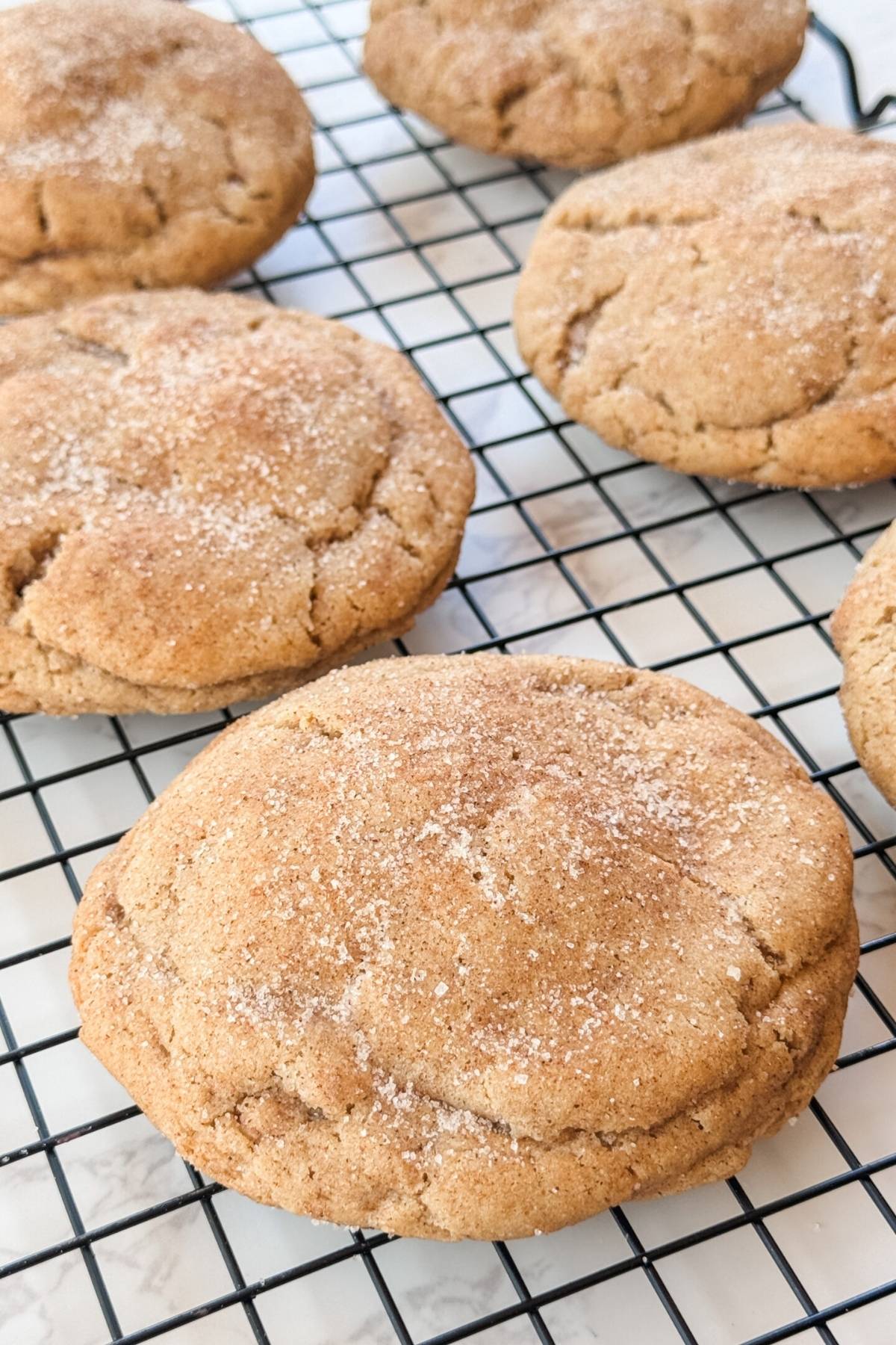 snickerdoodle cookies on cooling rack
