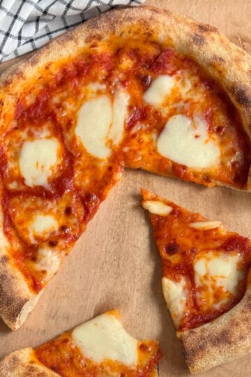 sourdough pizza on a cutting board