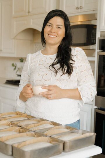 maria baradell and bread dough in loaf pans