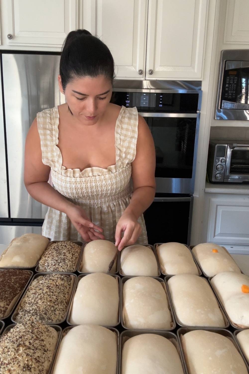 Maria scoring bread she made at home