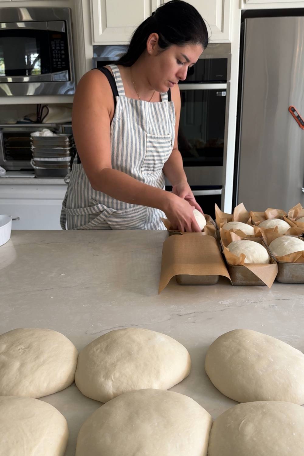 baker shaping bread