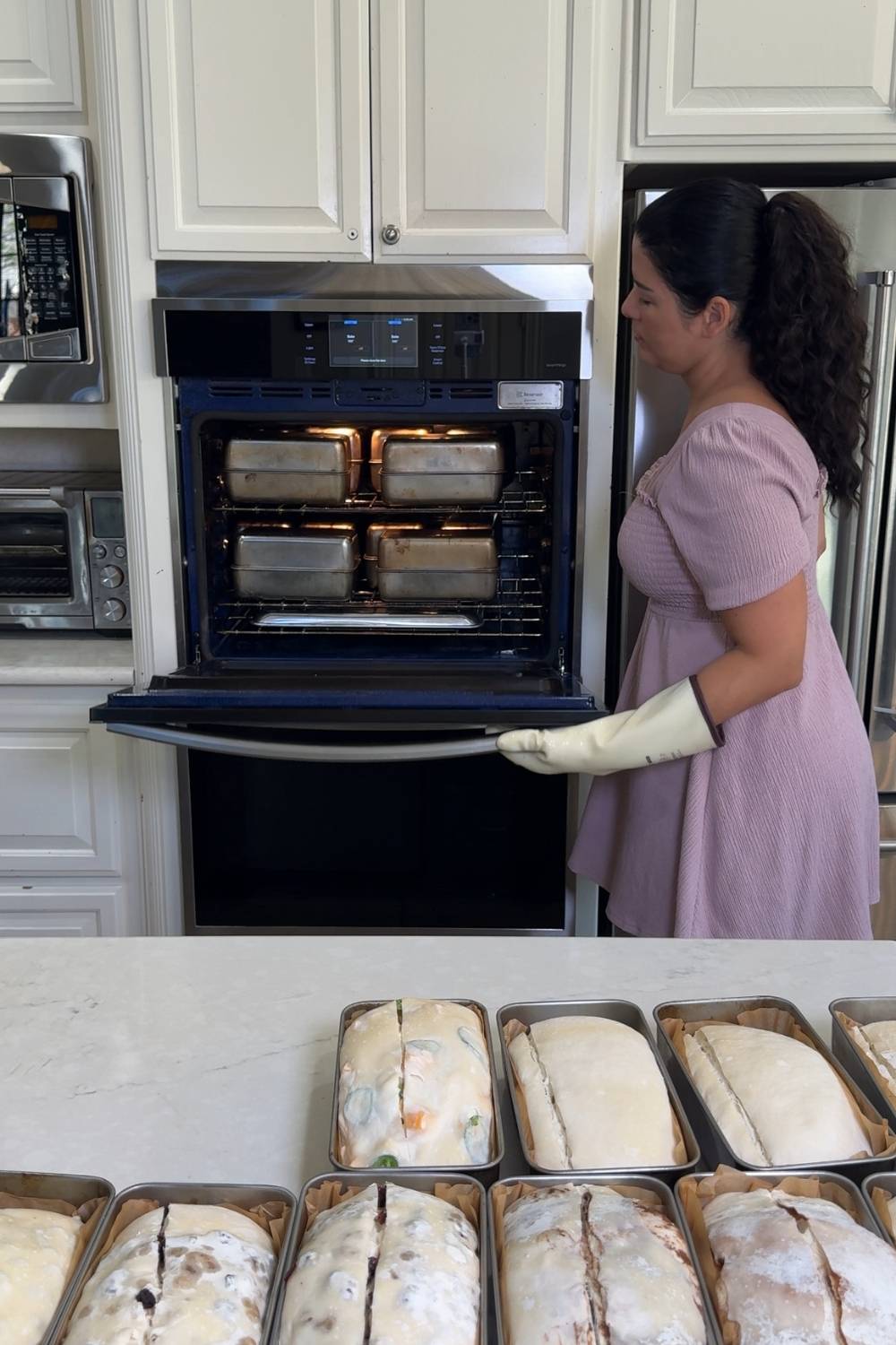 baker showing bread baking in her oven using the Two Pan Method