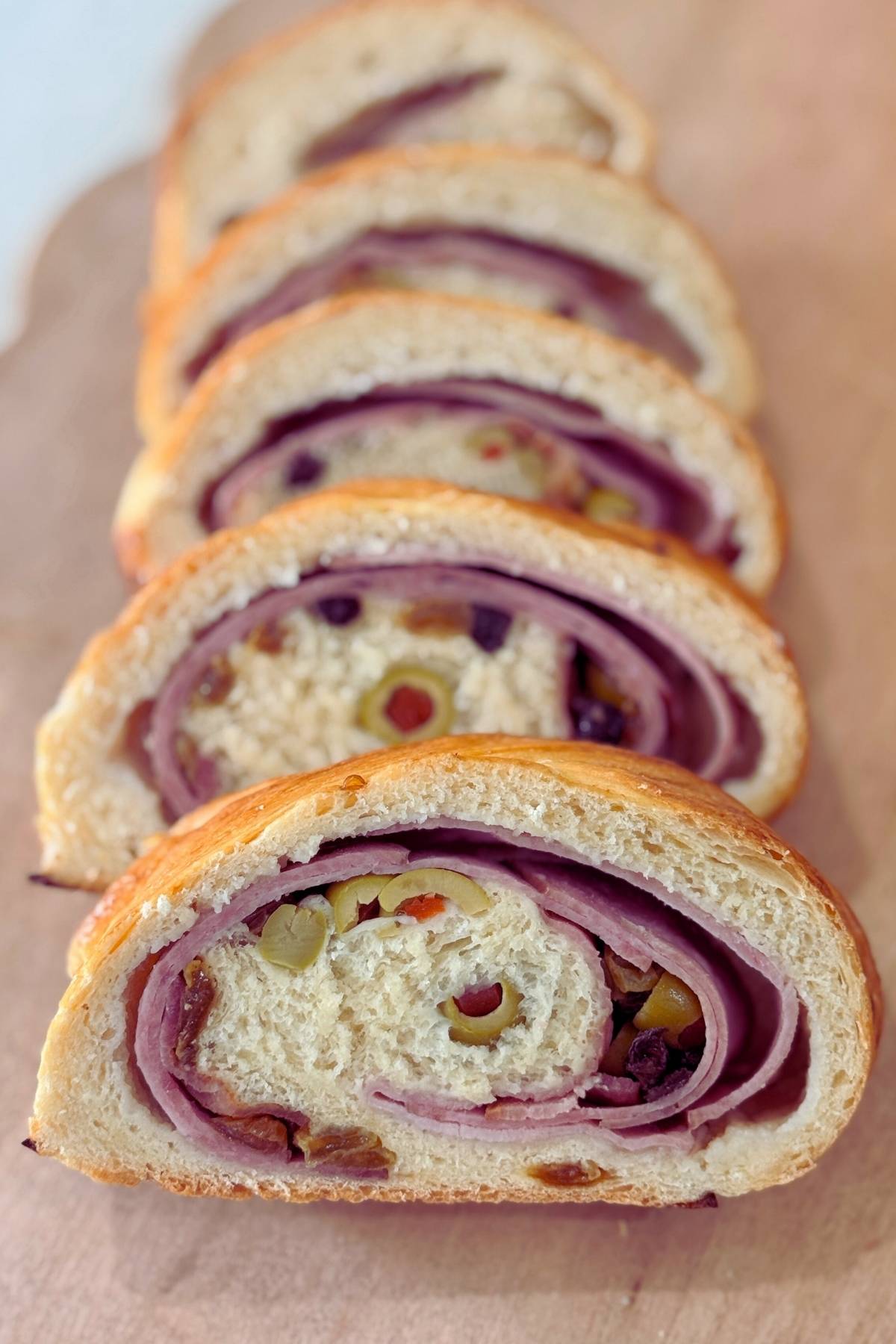 slices of Sourdough Pan de Jamon on a cutting board