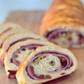 Sourdough Pan de Jamon sliced on a cutting board