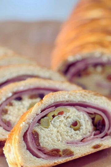 Sourdough Pan de Jamon sliced on a cutting board
