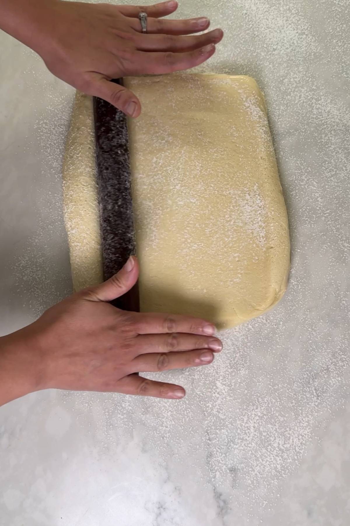 Rolling the dough for the Yeast Pan de Jamon