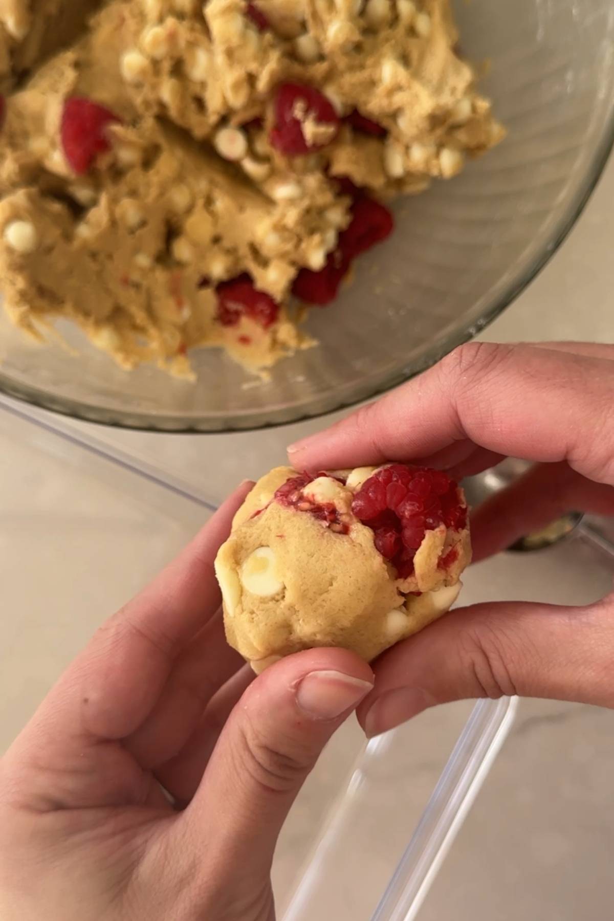shaping white chocolate raspberry cookie dough