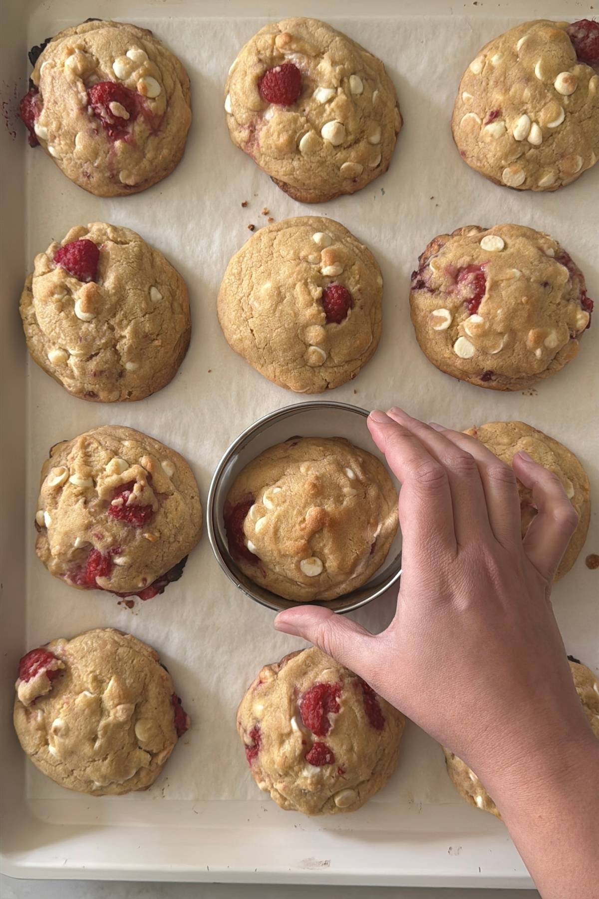 shaping white chocolate raspberry cookies