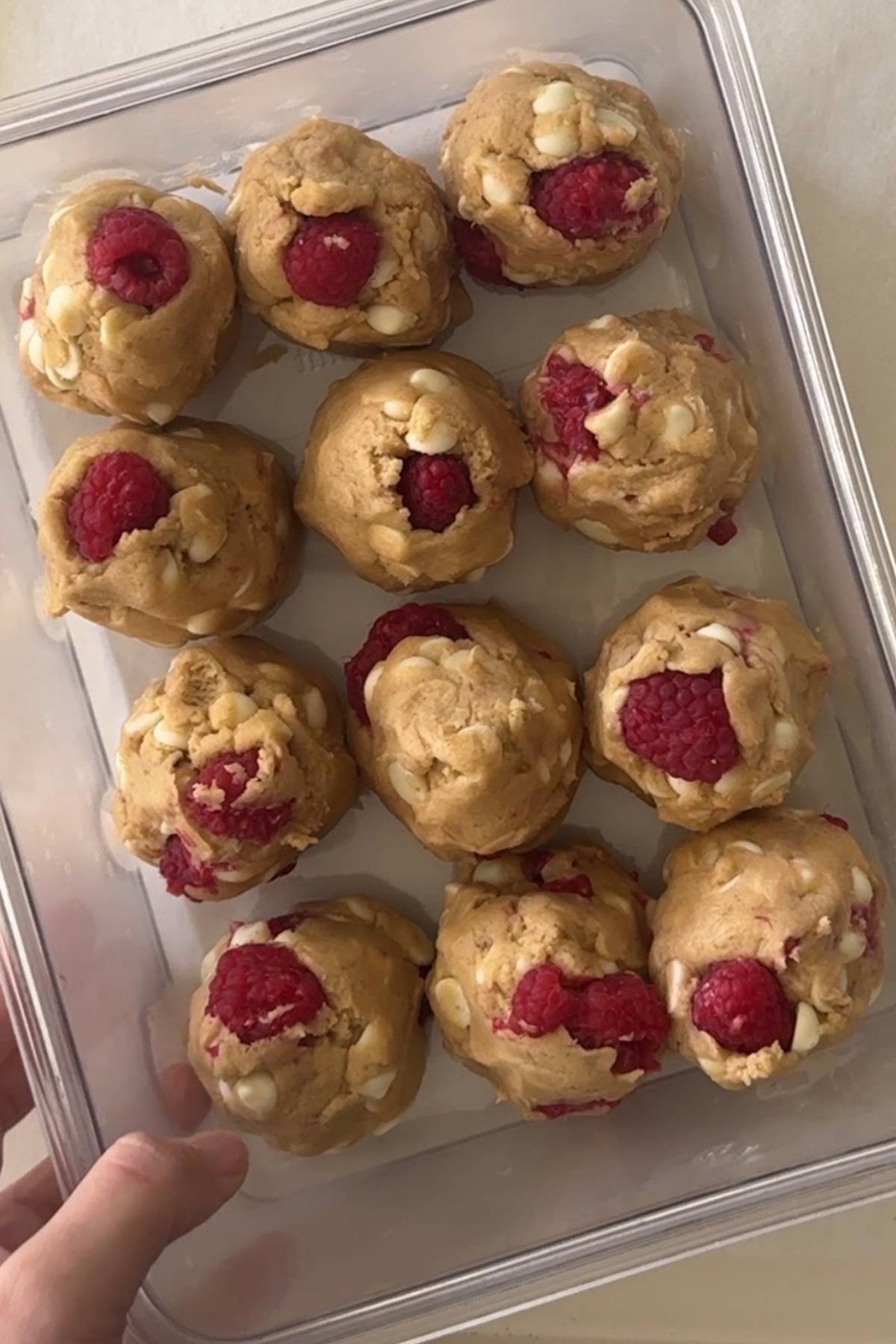white chocolate raspberry cookie dough shaped ready to be chilled