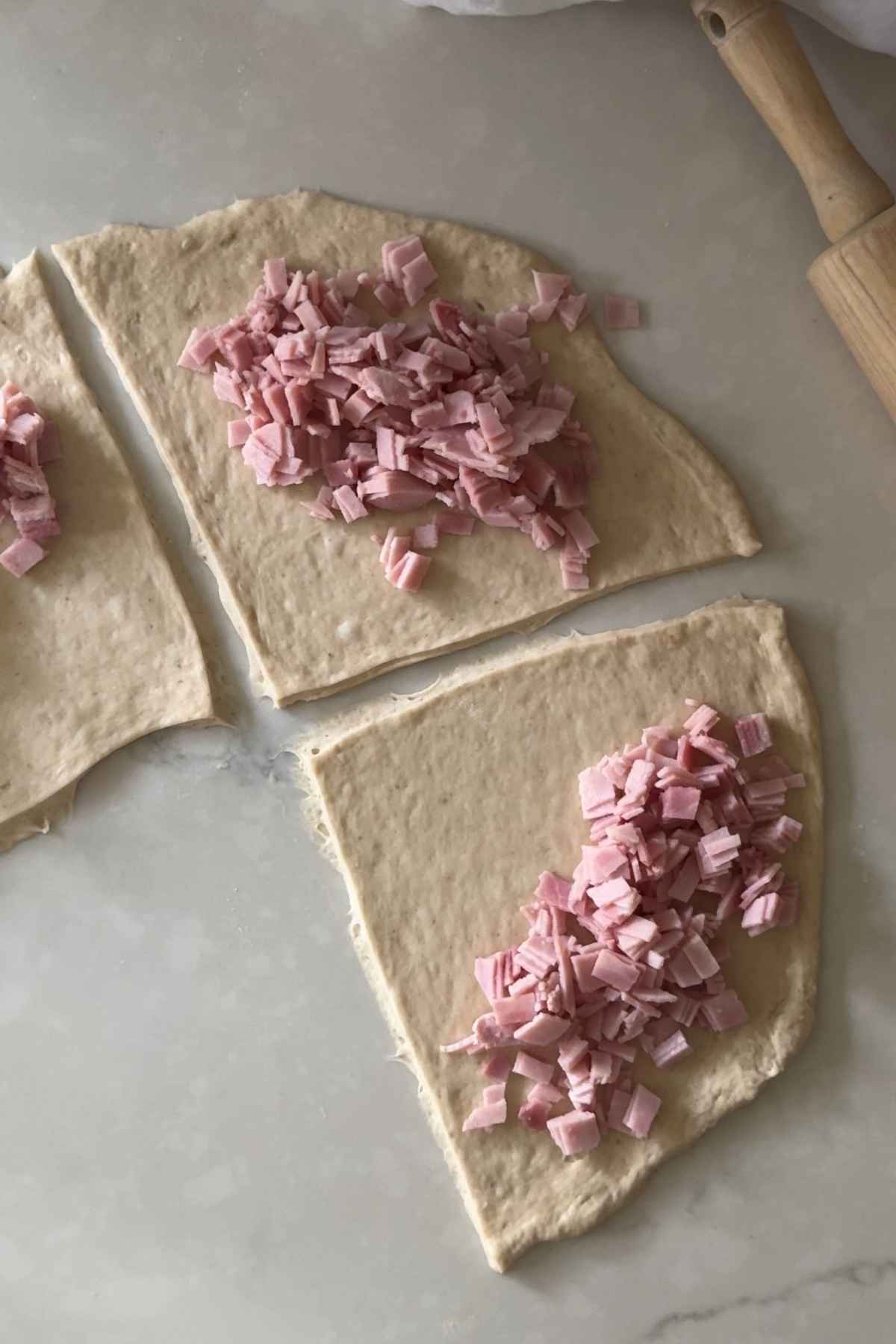 adding ham to Cachitos de Jamon - Harm Horns