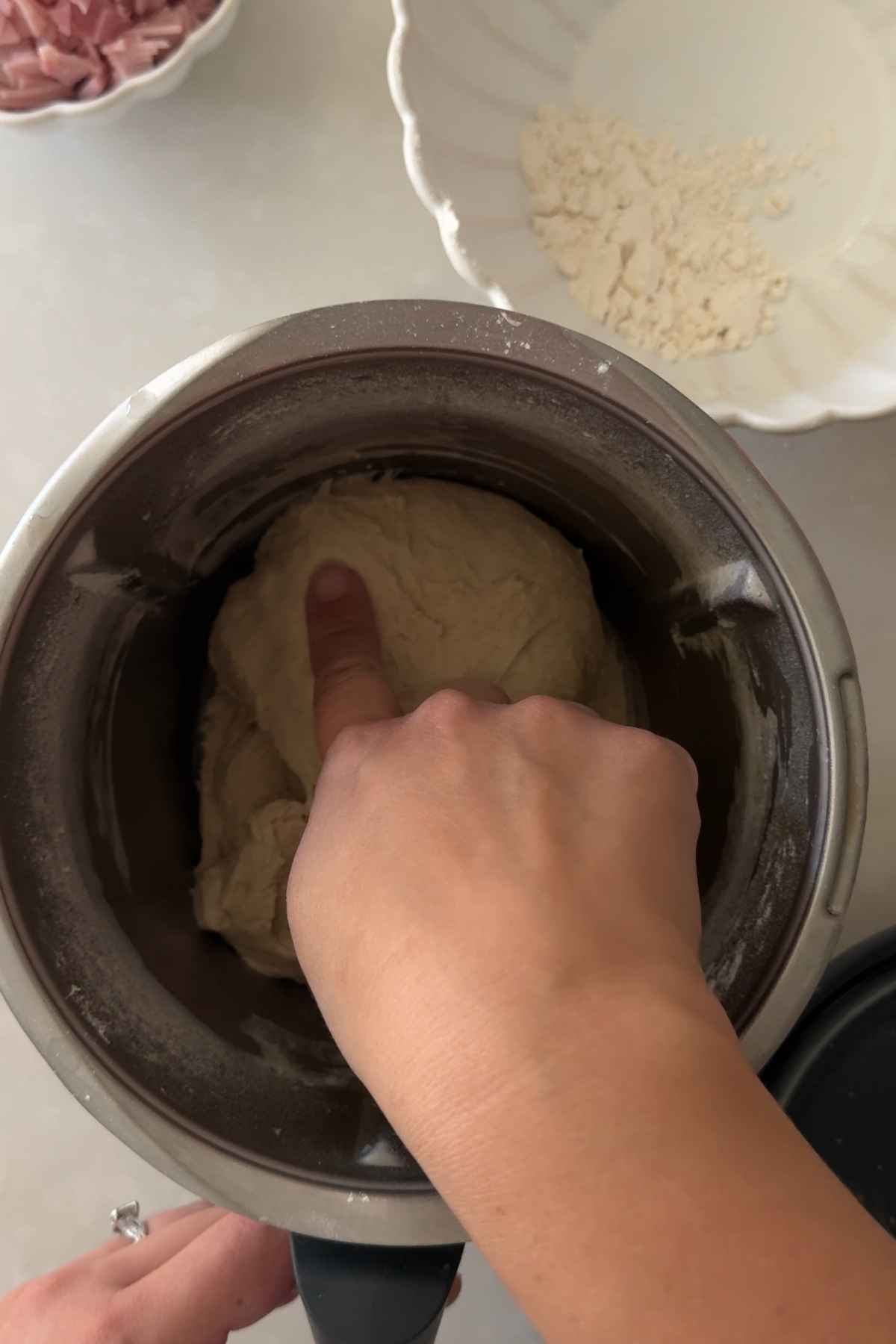 mixing the dough for Cachitos de Jamon - Harm Horns